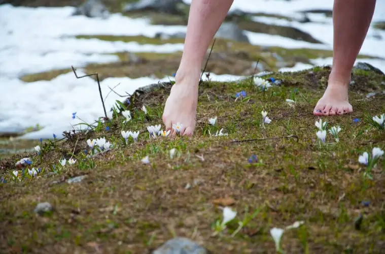 walking barefoot through wildflowers
