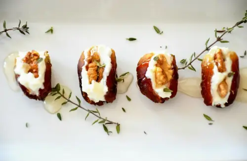 several stuffed dates with herbed cashew cheese 
